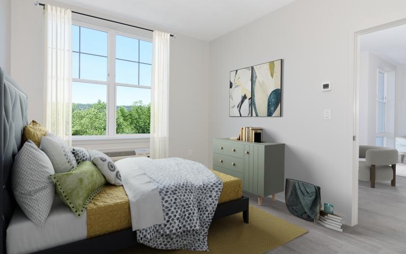 bedroom with bright windows